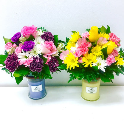 Two flower bouquets in candles on a white background for flower delivery in Miami