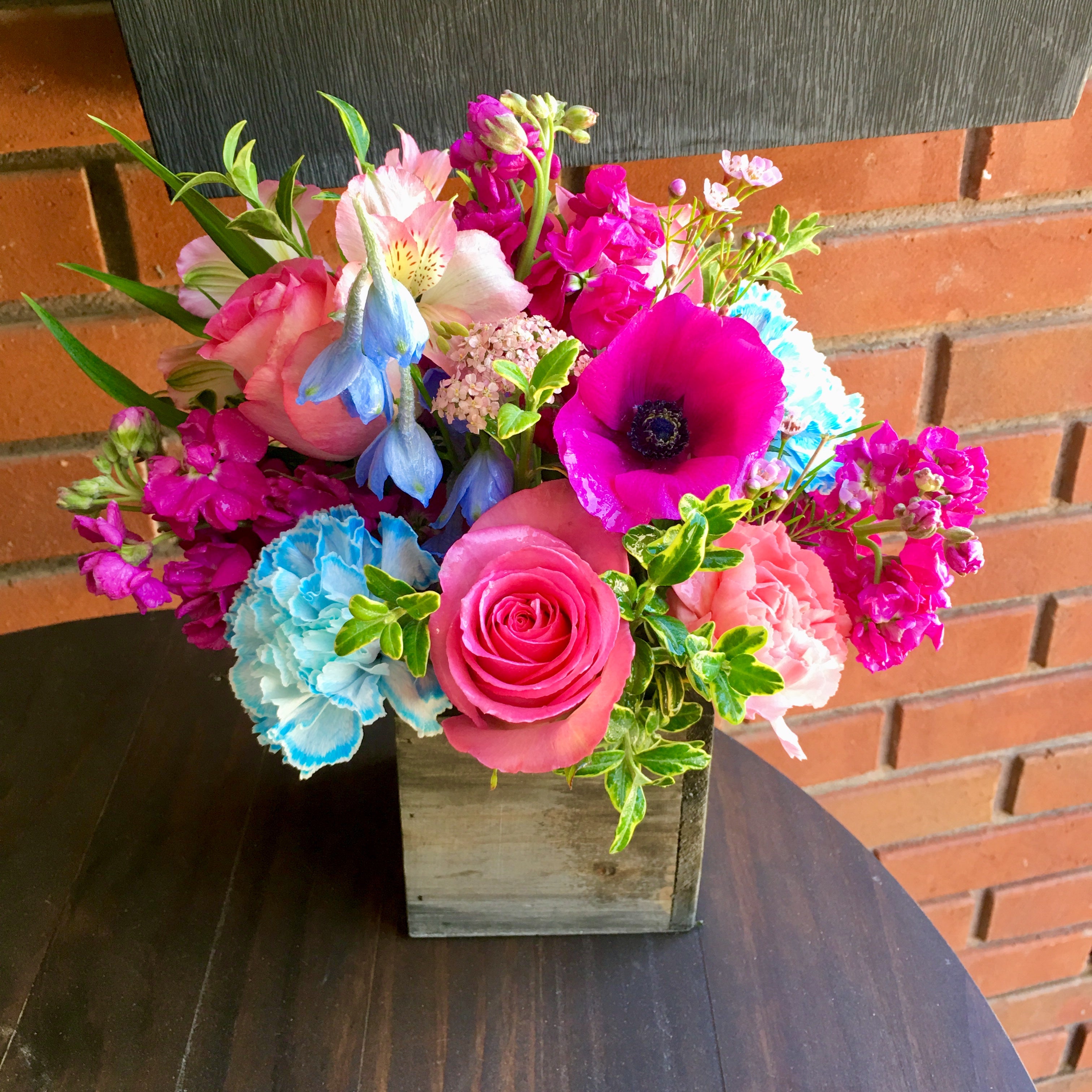 Pembroke Pines flower delivery bouquet in wood box with blue and pink flowers. Sending flowers to Pembroke Pines
