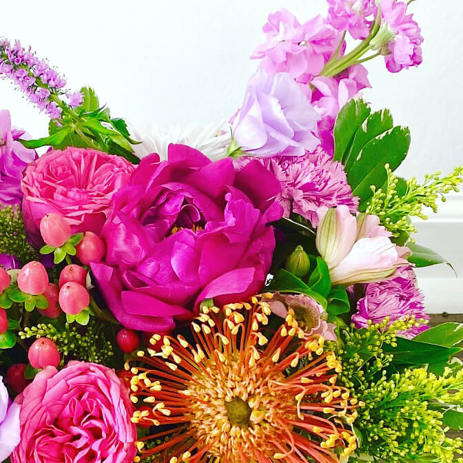 Bouquet of colorful flowers including pink, purple, and green for delivery in Sunny Isles Miami same day